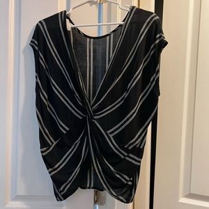 Black striped sleeveless blouse